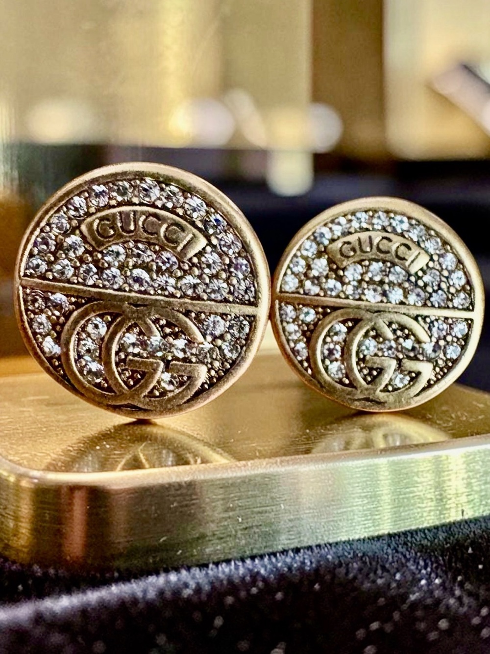 Crystal Logo Round Button Earrings - Gold Tone